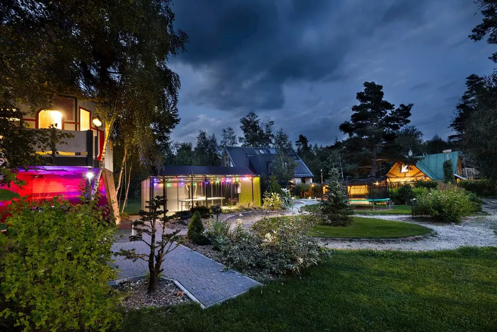 A wide evening view across the landscaped Green Park estate